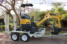 Mini digger excavator on a construction site